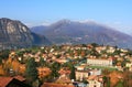 Aerial view on town among mountains on Lake Como. Royalty Free Stock Photo