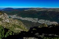 Aerial view of a town on slope of the mountain on a sunny day Royalty Free Stock Photo