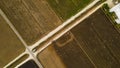 Aerial view tractor in the middle of paddy field Royalty Free Stock Photo