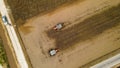 Aerial view tractor in the middle of paddy field Royalty Free Stock Photo