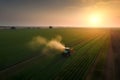 Tractor spray fertilizer on green field drone high angle view, agriculture background concept