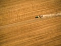 Aerial view of a tractor working a field Royalty Free Stock Photo