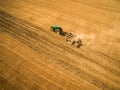Aerial view of a tractor working a field Royalty Free Stock Photo