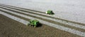 Aerial view of tractors harvesting cotton on a farm in Goias, Brazil