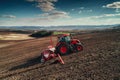 Aerial view of tractors working on the harvest field Royalty Free Stock Photo