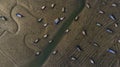 Traditional fish boats stranded on mudflats