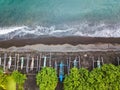 Aerial view of traditional Indonesian fishing boats on beach