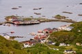 Aerial view on traditional Norwegian fisherman Rorbu houses in small port village with islets around, Vesteralen, Norway