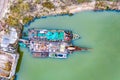 Aerial view of traditional sand miners on the river