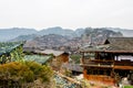 Aerial view of traditional wooden building rooftops of Xijiang Qianhu Miao Village The One Thousand Household Miao Village , in