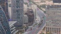 Aerial view of traffic on Al Saada street in financial district day to night timelapse in Dubai, UAE. Royalty Free Stock Photo