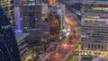 Aerial view of traffic on Al Saada street in financial district day to night timelapse in Dubai, UAE. Royalty Free Stock Photo