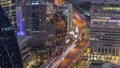 Aerial view of traffic on Al Saada street in financial district day to night timelapse in Dubai, UAE. Royalty Free Stock Photo