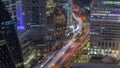 Aerial view of traffic on Al Saada street in financial district day to night timelapse in Dubai, UAE. Royalty Free Stock Photo