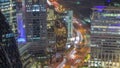 Aerial view of traffic on Al Saada street in financial district night timelapse in Dubai, UAE. Royalty Free Stock Photo