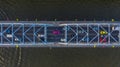 Aerial view on traffic bridge over river, cars on bridge