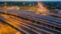 Aerial view traffic car transportation freeway motorway and ring road at twilight Royalty Free Stock Photo
