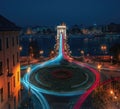 Aerial view of traffic at Clark Adam Square roundabout with Szechenyi Chain Bridge and Danube river at night - Budapest, Hungary Royalty Free Stock Photo