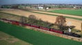 Aerial view of a train passing through the countryside Royalty Free Stock Photo
