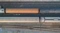 Aerial view of Train and railway tracks - top view pov of rails as abstract background. Royalty Free Stock Photo