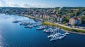 Aerial view of a tranquil marina with moored sailing boats in a coastal town Royalty Free Stock Photo