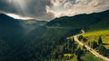 Aerial view of Transbucegi road in Bucegi Mountains from Romania in cloudy summer landscape Royalty Free Stock Photo