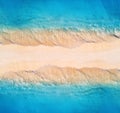 Aerial view of blue sea with waves on the both sides at sunset Royalty Free Stock Photo