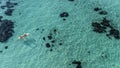 Aerial view of transparent kayak on the tropical blue sea. Seaside