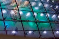 Aerial view of transparent roof on an ice skating rink with decorative lamps