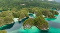 Aerial View Of Triton Bay In Raja Ampat Islands: Lagoon With Turquoise Water And Green Tropical Trees. Wide Angle Nature