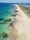 Aerial view of a tropical beach coastline with crystal clear blue waters Royalty Free Stock Photo