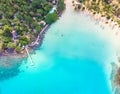 Aerial view of tropical beach at island hotel resort with blue sea water and coconut palm trees, beautiful summer vacation Royalty Free Stock Photo