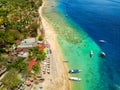 Aerial view of a tropical beach resort next to a coral reef on a small island (Gili Air, Indonesia