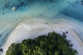 Tropical island with white sand beach and blue clear water and granite stones, speedboats above coral reef. Similan Royalty Free Stock Photo