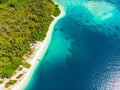 Aerial view tropical paradise pristine beach rainforest blue lagoon bay coral reef caribbean sea turquoise water at Banyak Islands Royalty Free Stock Photo