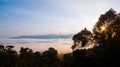 Aerial view of a tropical rainforest in Lenggong, Perak lit by the warm glow of the rising sun