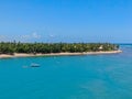 Aerial view of tropical white sand beach, palm trees and turquoise clear sea water in Praia do Forte Royalty Free Stock Photo