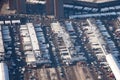 Aerial view of truck dock, view of the food base warehouse with many trucks with trailers for cargo delivery