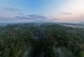 Aerial view of Tumpak Sewu waterfall and Semeru mountain at sunrise located in Lumajang. East Java, Indonesia, August 28, 2022