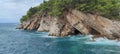 Aerial view of the turquoise water waves of the Adriatic Sea in Budva, Sveti Stefan, Montenegro