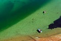 Aerial view of two fishing boats mooring on turquoise water