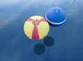 Two balloons over the water. Top view. Royalty Free Stock Photo