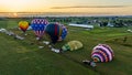 Aerial View on Two Hot Air Balloons Launching, in the Early Morning, From a Field in Rural America