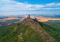 Aerial view of two stone towers, ruins of medieval castle Hazmburk, Czech republic