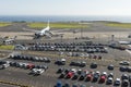 Aerial view on typical airport parking at SÃÂ£o Miguels JoÃÂ£o Paulo II Airport, with the parking lot in the foreground and