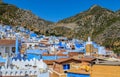 Aerial view of a typical Moroccan city with blue colored houses