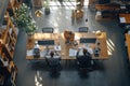 Aerial view of university or public library with students and researchers using computers Royalty Free Stock Photo