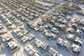 aerial view of unplowed snowy neighborhood