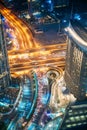 Aerial View Of Urban Background Of Illuminated Cityscape With Towers In Dubai. Street Night Traffic In Dudai Skyline Royalty Free Stock Photo