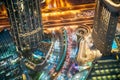 Aerial View Of Urban Background Of Illuminated Cityscape With Towers In Dubai. Street Night Traffic In Dudai Skyline Royalty Free Stock Photo